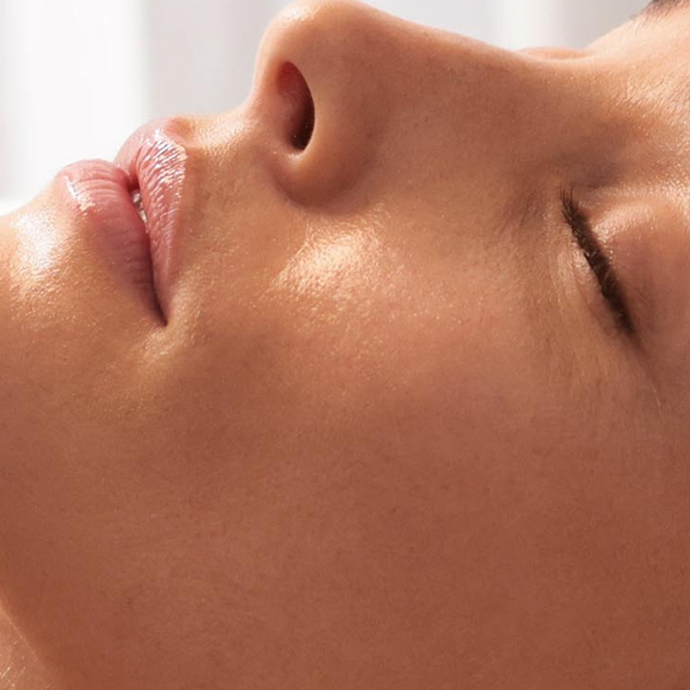 Close-up of a person's face with a blurred background